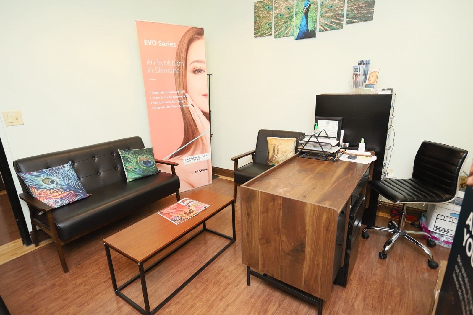 Skincare suite reception desk with lounge seating