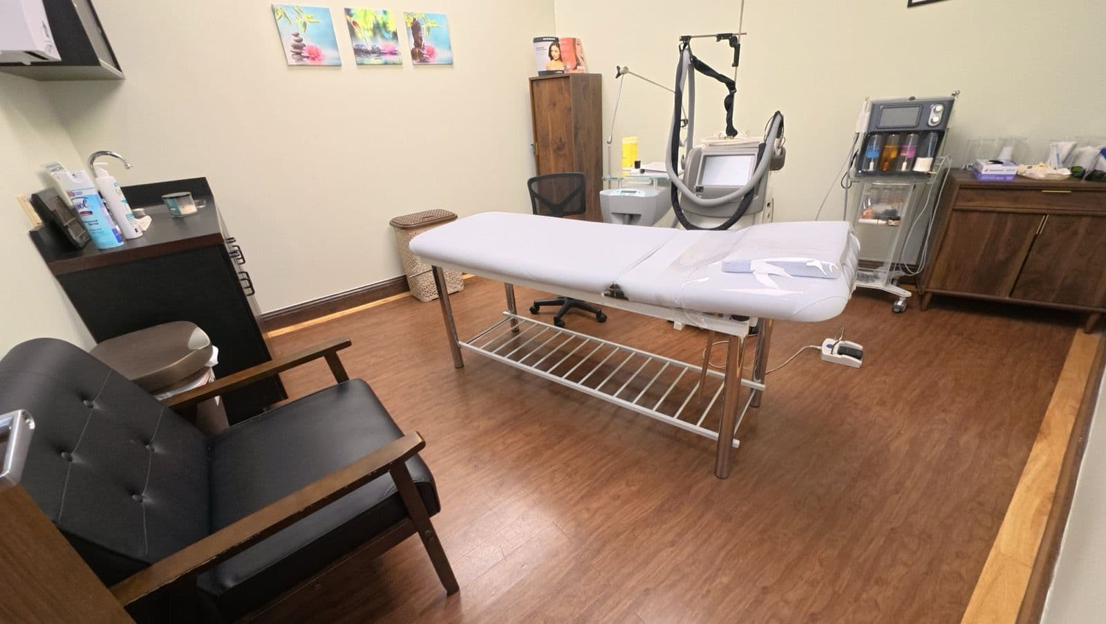 Treatment room with a facial bed and skincare equipment